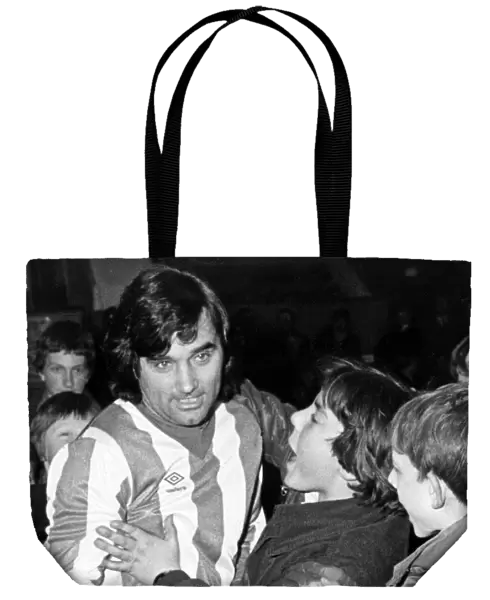 George Best meets the fans in the No. 7 Nuneaton Borough shirt