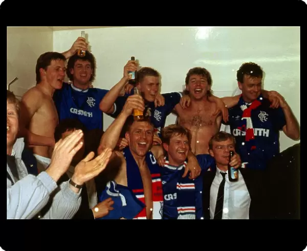 Rangers players celebrate in dressing room May 1987