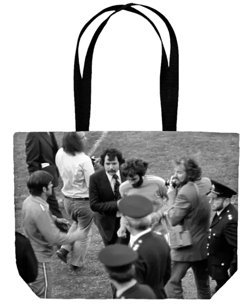 George Best being escorted off the pitch by Manager Barry Fry