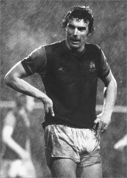 West Ham footballer Trevor Brooking in the pouring rain Circa 1981