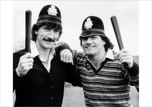 Kevin Keegan and Terry McDermott of Newcastle United with police truncheons