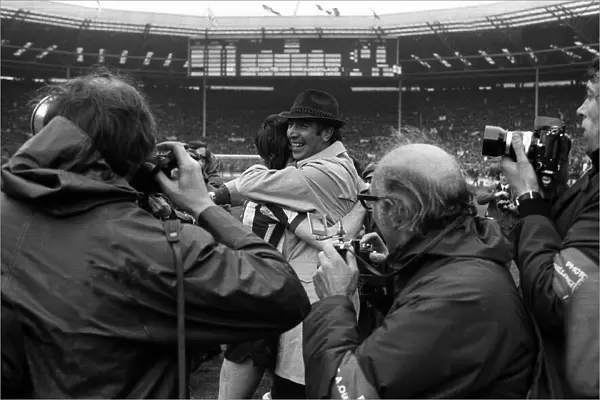 Bob Stokoe hugs team member after Sunderland won the FA cup final 1973 against Leeds