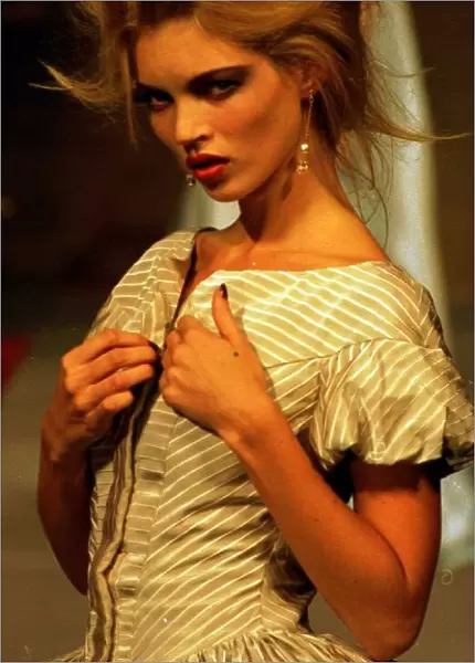 kate Moss model wearing Vivienne Westwood creation on Paris catwalk