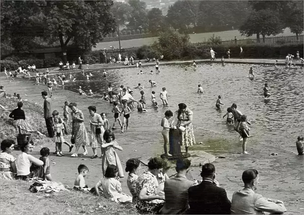 The paddling pool in Cannon Hill Park - packed with toddlers while thte Mother