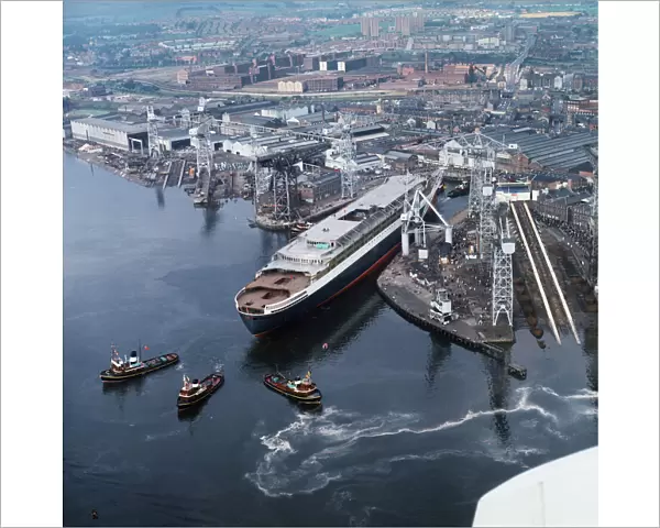 Ship Queen Elizabeth II - September 1967. Crowds gather as the QE2 is launched at