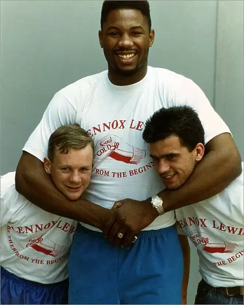 Lennox Lewis Boxing Heavyweight Boxer with his arms around the necks of Alan Hall