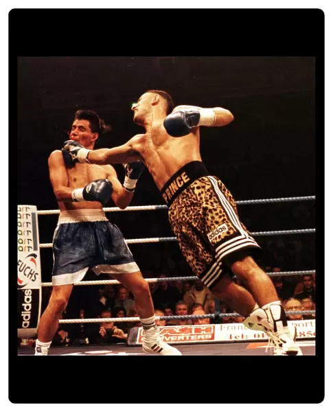 Prince Naseem Hamed lands a right hand on the jaw of Remigio Molina of Argentina in their