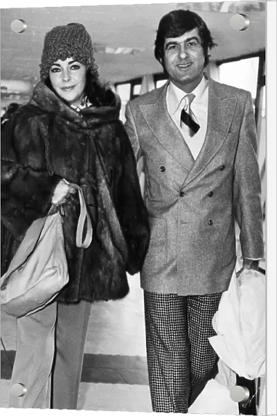Elizabeth Taylor with boyfriend Henry Wynberg at Heathrow about to board a plane to Los