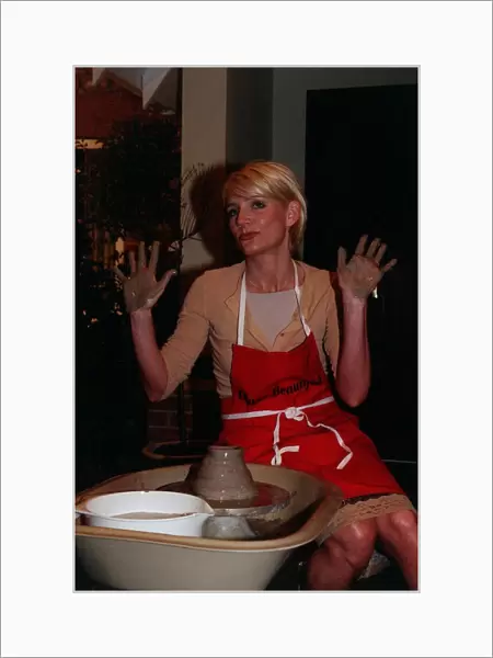 Michelle Collins Actress March 98 Trying her hands on the potters well outside