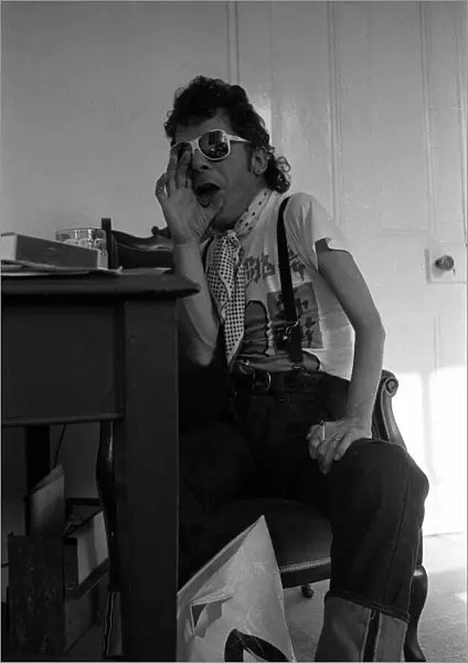 Rock Star Ian Dury poses during an exclusive interview for the Daily Mirror in his