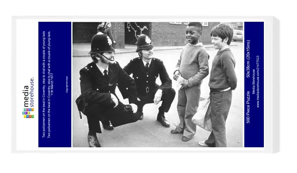 Two policemen on the beat in Coventry, stop to chat with a couple of young lads