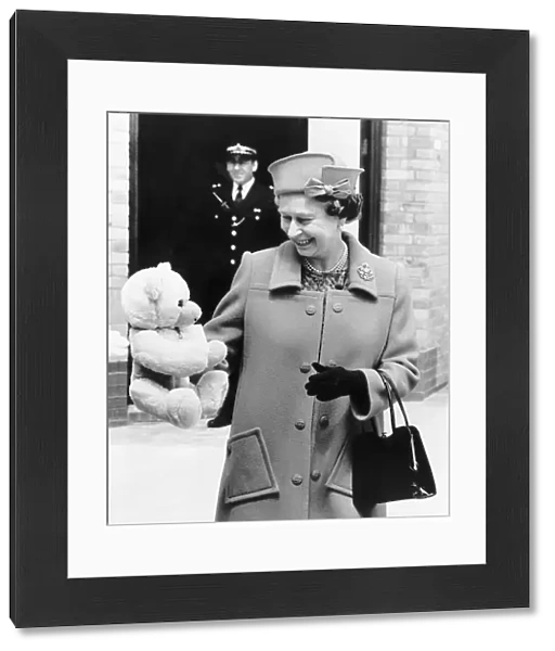 HRH Queen Elizabeth II With teddy bear for Princess Beatrice June 1989