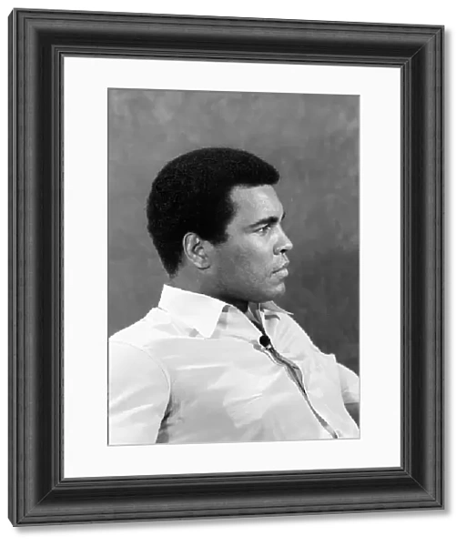 Former American heavyweight boxing champion Muhammad Ali looking in relaxed mood shortly