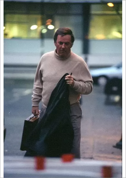 Terry Wogan TV Presenter December 98 Outside BBC studio in london carrying jacket