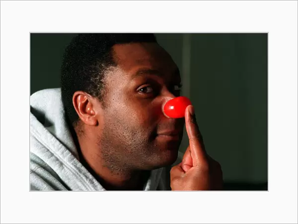 Lenny Henry Comedian December 1997 Wearing red nose for Red Nose Day