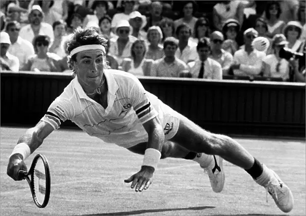 Pat Cash dives for the ball during the match against Mats Wilander
