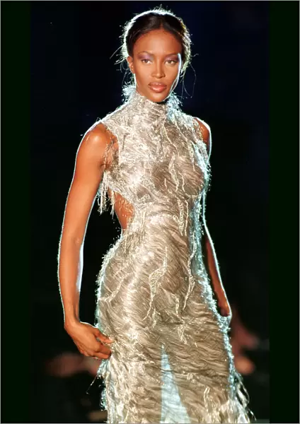 Naomi Campbell modelling a mesh dress designed July 1998 by Donatella Versace for Paris