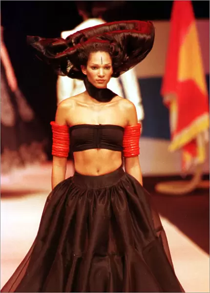 A model walking down the catwalk October 1997 showing Christian Lacroix latest designs in
