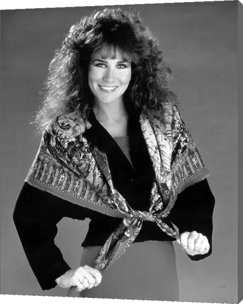 Linda Lusardi Model Ex Page 3 girl wearing a scarf over a jumper and a skirt