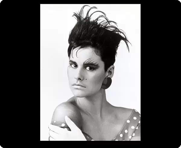 Flat top hairstyle of the mid 1980s Model with an unusual hair style