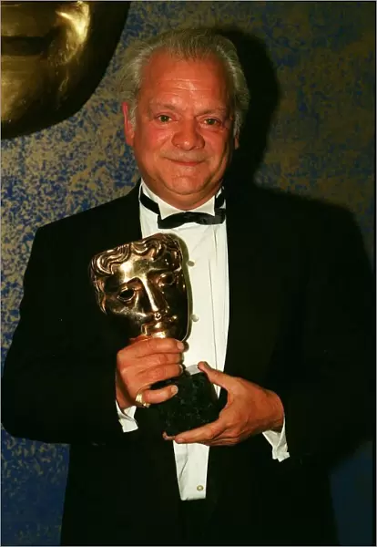 David Jason holding his Bafta award he received for Best Comedy Performance