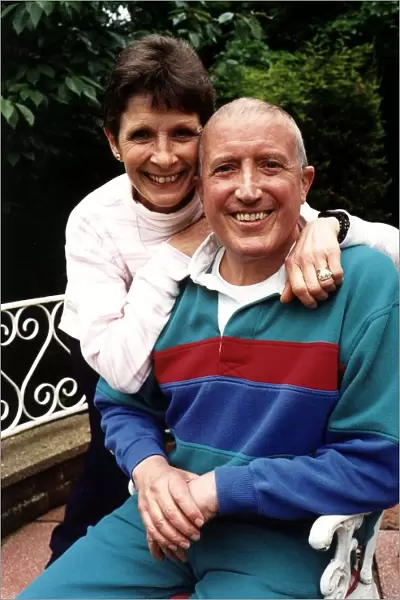 Roy Castle TV Presenter with wife in garden sitting down