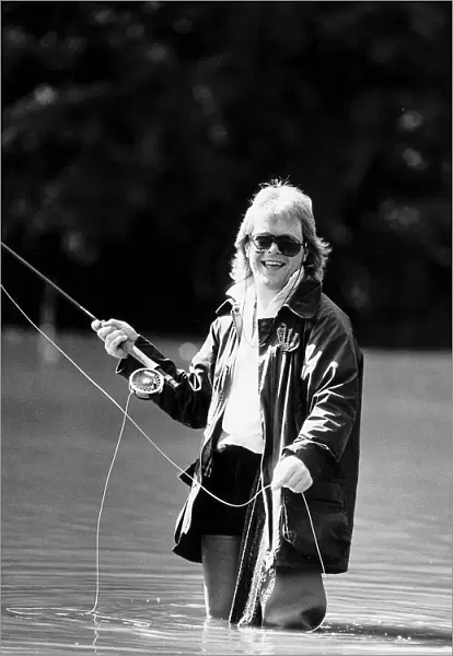 Bruno Brookes Disc Jockey practices his fly fishing in one of the ponds near his home in