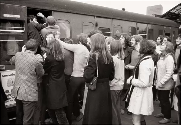 Sixty-five people cram themselves into one tiny railway compartment
