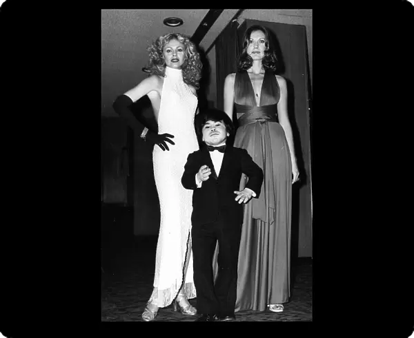 Britt Ekland actress with Maud Adams and Herve Villechaize at premiere of
