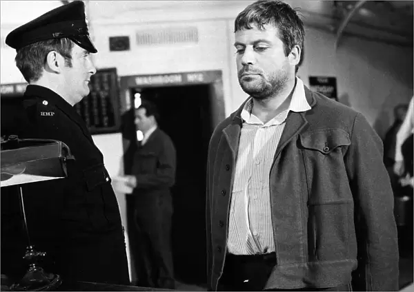 Oliver Reed British actor in film Sitting Target 1971 in jail facing prison