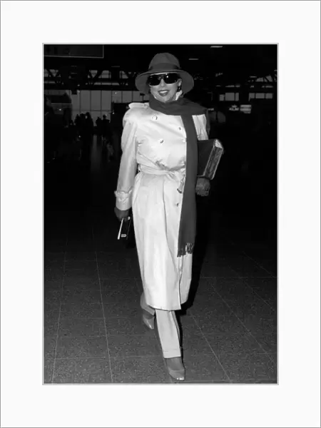 Joan Collins actress leaving for Los Angeles in March 1988
