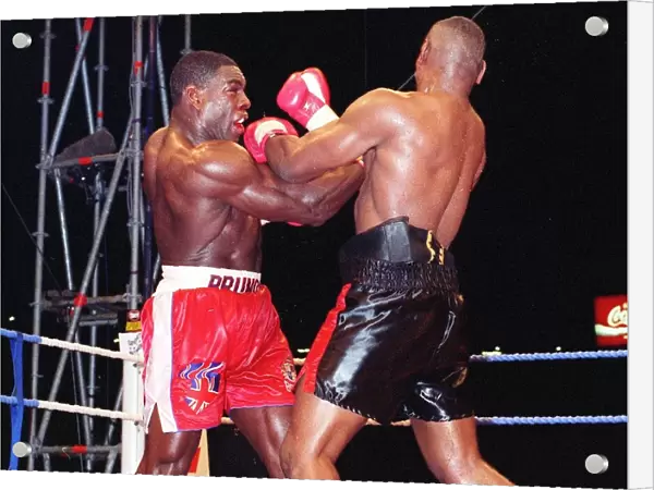 Frank Bruno lands another punch to the head of Oliver McCall in his WBC championship
