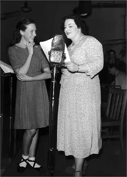 Julie Andrews Actress with actress Hatti Jaques in the radio programme Educating Archie
