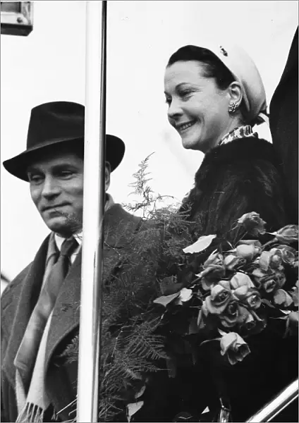 Sir Laurence Olivier actor and wife Vivien Leigh actress arriving at London Airport