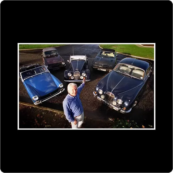 Jaguar Cars November 1999 man standing with cars