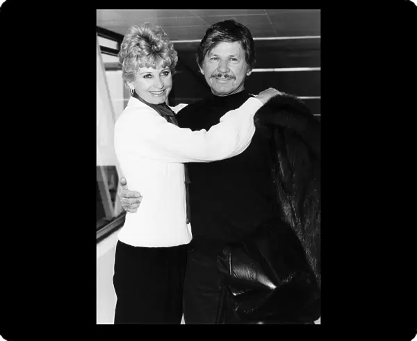 Charles Bronson Actor with wife at airport March 1984 Dbase