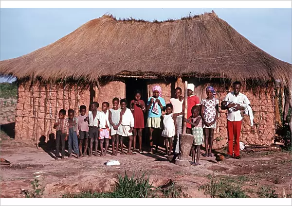 A typical African hut and villagers in Quimbang Africa
