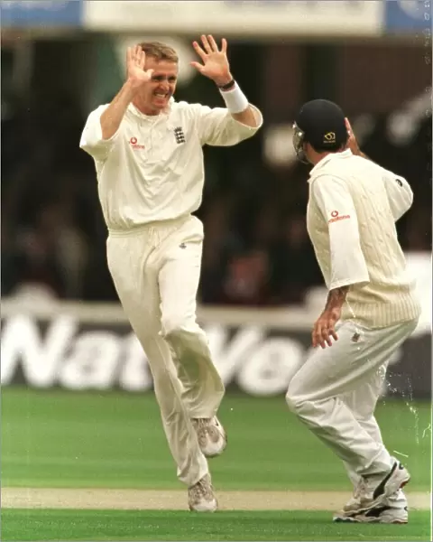 Dominic Cork of England celebrates first wicket June 1998 During the England v