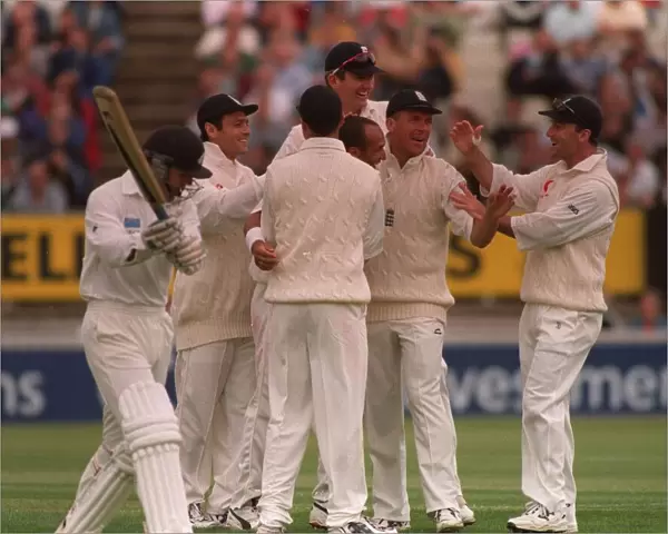 Mark Butcher celebrates wicket of Astle July 1999 with rest of England Cricket team