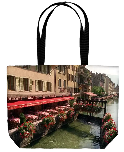France Restaurants Auberge Du Lyonnaise on the bank of the river running through Annecy