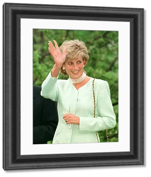 Princess Diana smiles and waves to the students of Northwestern University in Evanston