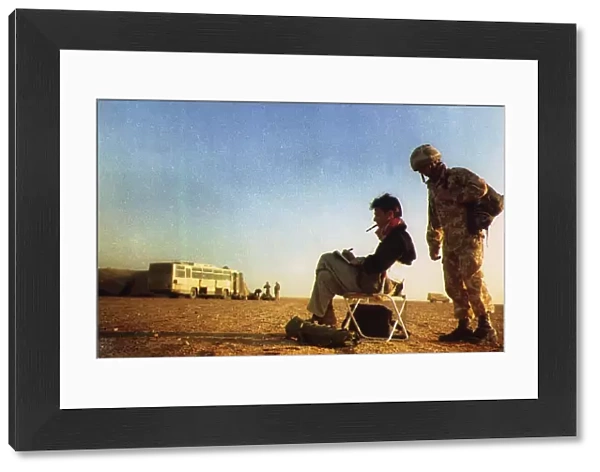 John Kean Official British war artist sketching in the desert on the Saudi border at
