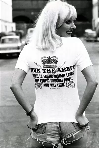 A model wearing a t-shirt with a controversial slogan in a London street August 1976