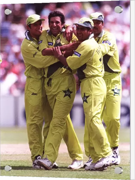 Wasim Akram is mobbed after getting the wicket June 1999 of Craig McMillan during