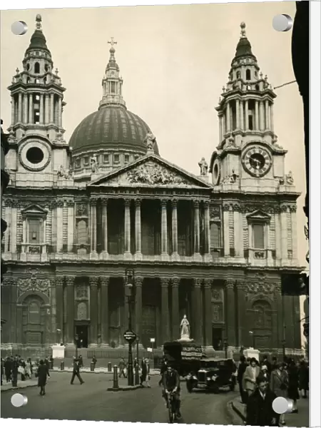 The main entrance to St Pauls Cathedral Traffic Pedestrians Car