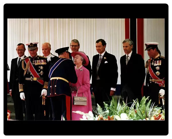 Queen Elizabeth II King Harald V of Norway kissing Queen pink coat hat Charlotte Square