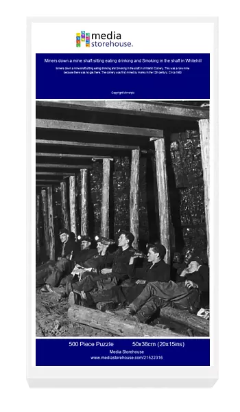Miners down a mine shaft sitting eating drinking and Smoking in the shaft in Whitehill