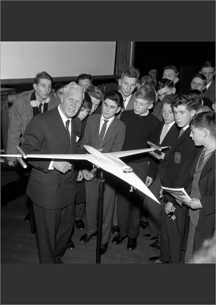 Barnes Neville Wallis, aeronautical engineer. Lectures Children on his model