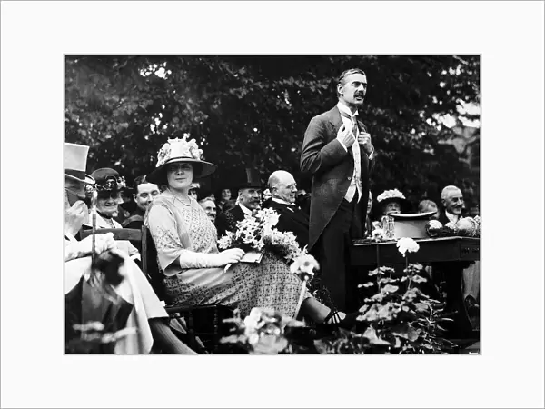 Neville Chamberlain agives a speech to his local conservative association with wife MSI