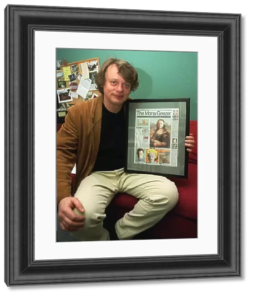 Martin Clunes actor February1999 with his Mirror mock up